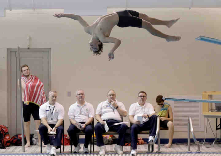 Westerville South's Chip McGrew competes in the 1 meter dive during a meet at Westerville Community Center.